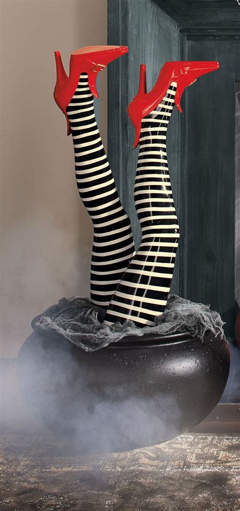 Quirky and unforgettable: flipped witch legs as a focal point for your Halloween party